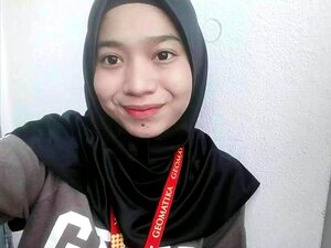 Malesialainen tyttö Taik Taekwondo kolmen kimppa