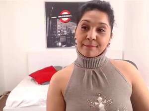 Feast your eyes on this Latina BBW MILF as she goes wild on webcam